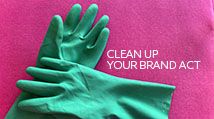 Green cleaning gloves on a velvet background