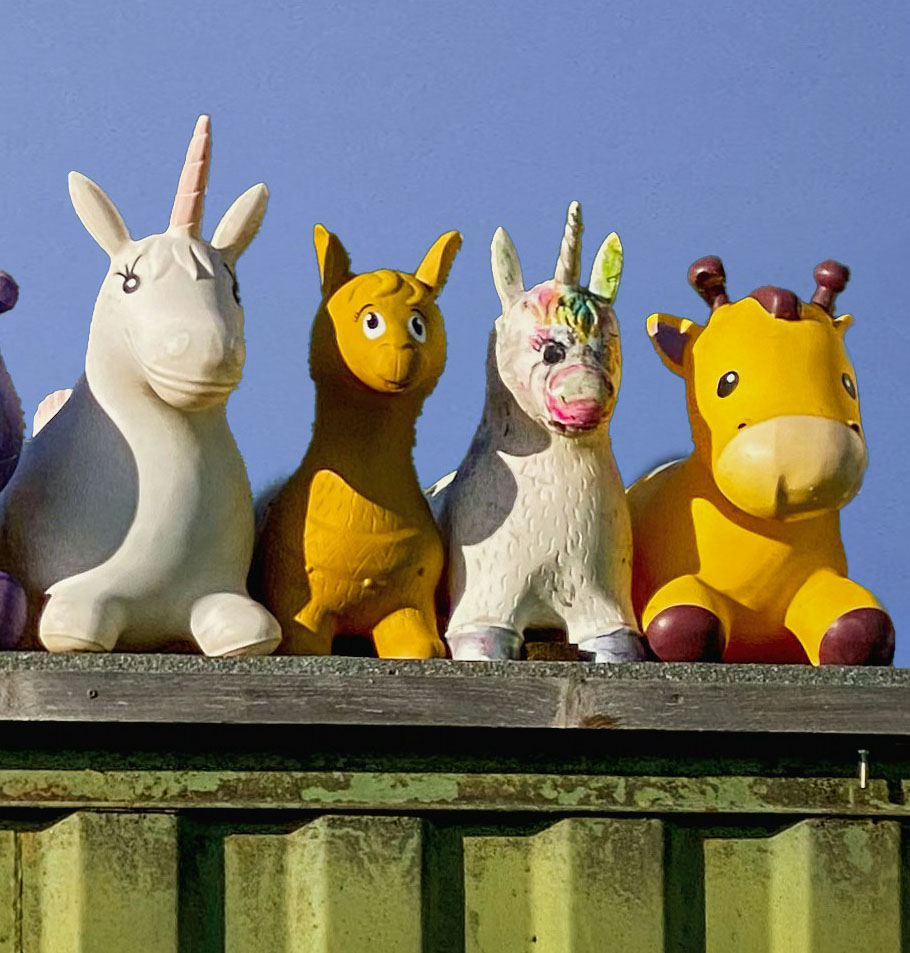plastic toy animals in shades of yellow and white